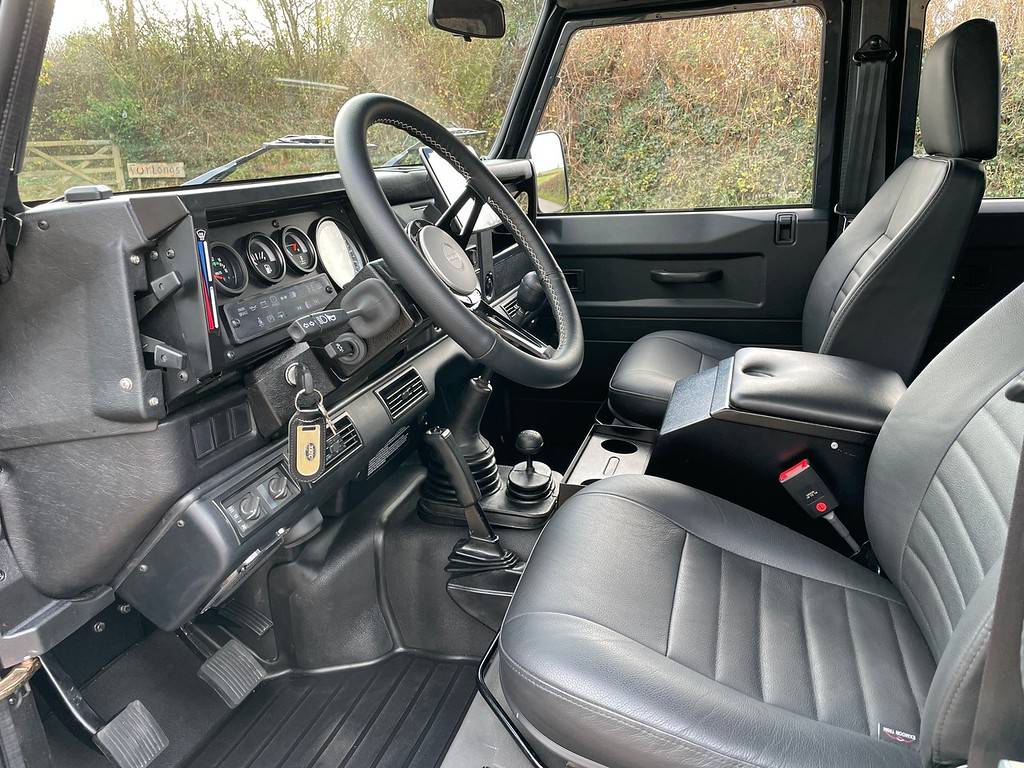 Land Rover Defender Brandon 130 Double Cab Black Metallic front seats